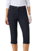 Person wearing navy capri pants on a white background