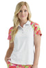 Woman wearing a white polo shirt with colorful sleeves on a plain background