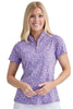 Woman wearing a purple floral patterned shirt on a white background