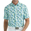 Man wearing a patterned polo shirt with a neutral background