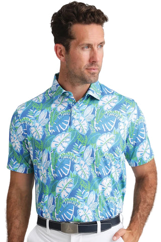 Man wearing a blue floral patterned shirt against a light background