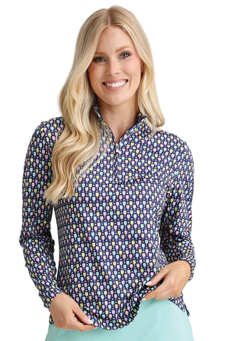 Woman wearing a patterned long-sleeve shirt on a white background