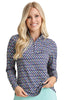 Woman wearing a patterned long-sleeve shirt on a white background