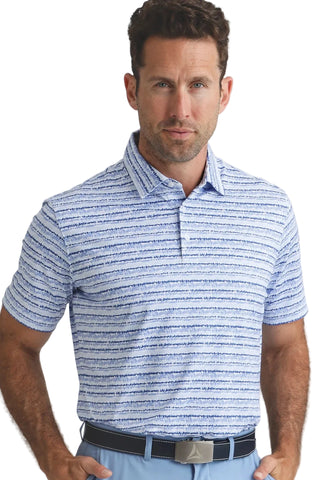 Man wearing a blue striped polo shirt against a plain background