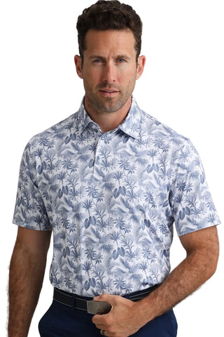 Man wearing a blue floral patterned shirt against a plain background