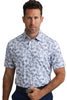 Man wearing a blue floral patterned shirt against a plain background
