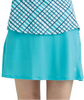 Personwearing a caspian blue skort on a white background