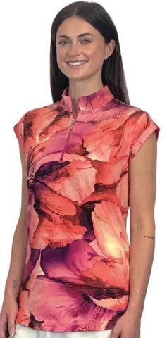 A woman modeling a cap sleeve, high-neck quarter-zip top with a vibrant pink, red, and orange floral print against a light gray background.