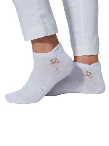 White ankle socks with gold anchor design worn by a person on a light gray background