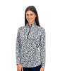 Woman wearing a navy and white patterned pullover on a white background