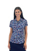 Woman wearing a patterned short-sleeve shirt on a white background