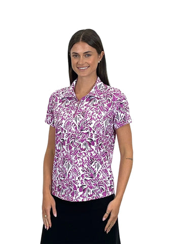 Woman wearing a purple patterned shirt on a white background