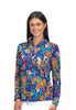 Woman wearing a colorful floral patterned shirt on a white background