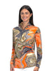 Woman wearing a colorful patterned long-sleeve shirt on a white background