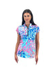 Woman wearing a colorful patterned shirt on a white background