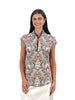 Woman wearing a patterned sleeveless top on a white background