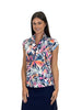 Woman wearing a colorful floral patterned shirt on a white background