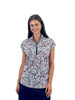 Woman wearing a patterned blouse on a white background