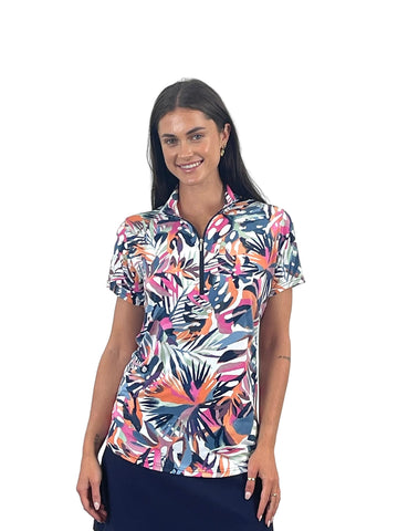Woman wearing a colorful patterned shirt on a white background