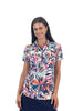Woman wearing a colorful patterned shirt on a white background