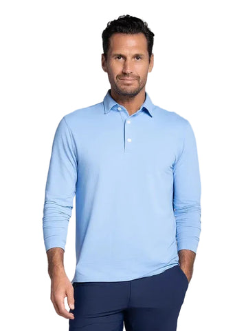 A man wearing a light blue long-sleeve polo shirt 