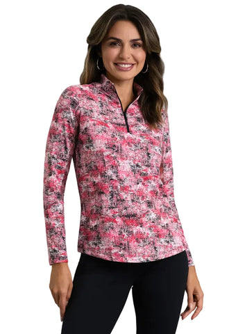 A woman modeling a pink and black abstract patterned long-sleeve quarter-zip pullover against a solid white background.