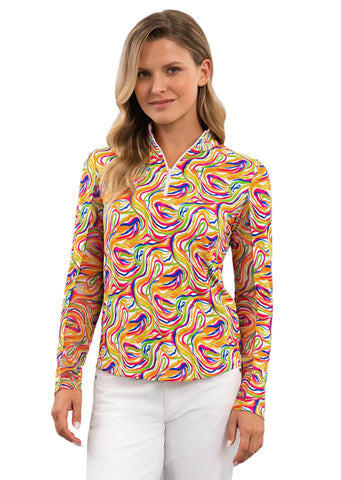 A woman modeling a long-sleeve quarter-zip pullover top with a vibrant multicolor psychedelic swirl pattern, paired with white shorts, against a solid white studio background.