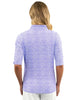 Person wearing a patterned purple shirt on a white background