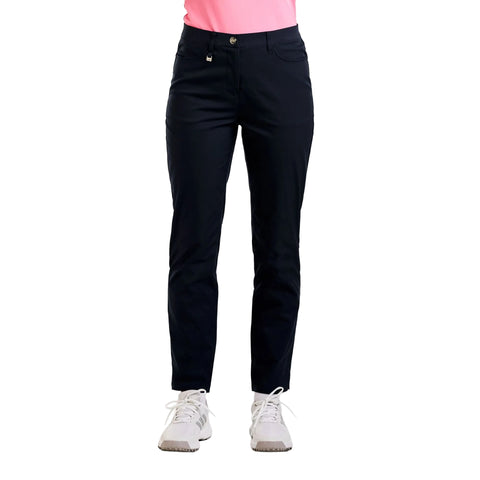 Black pants worn by a person on a white background