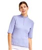 Woman wearing a light purple short-sleeve top on a white background