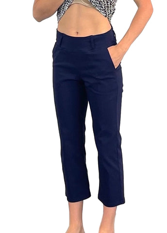 Navy blue pants worn by a person on a white background
