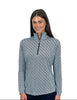 Woman wearing a patterned long-sleeve shirt on a white background