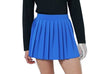 Person wearing a black top and blue skirt on a white background