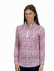 Woman wearing a pink floral patterned pullover on a white background