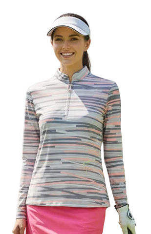 Woman in golf attire on a golf course