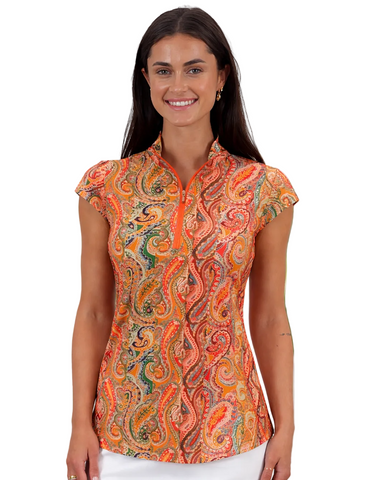 Woman wearing a colorful paisley patterned shirt outdoors