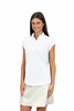 Model in white Corsican Golf cap-sleeve polo with white zip and light skirt
