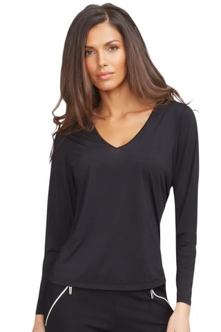 Woman wearing a black long-sleeve top on a white background