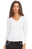 Woman wearing a white long-sleeve top and black pants on a white background